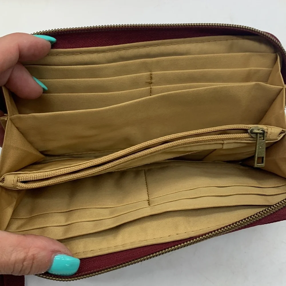 Red travelon standard size nylon wallet as is. SM3741